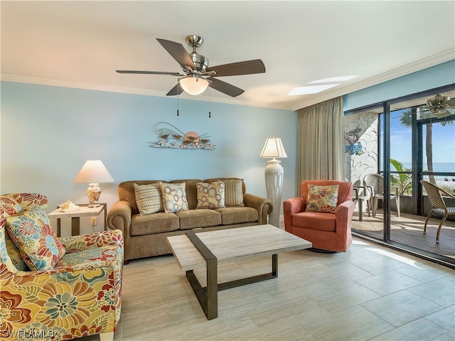 living room with crown molding and ceiling fan