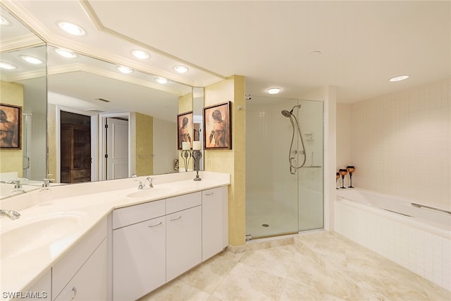 bathroom with independent shower and bath, double vanity, and tile floors