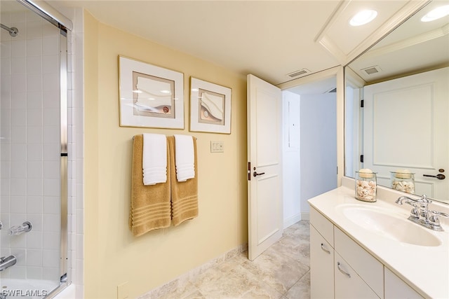 bathroom with a shower with door, tile floors, and oversized vanity