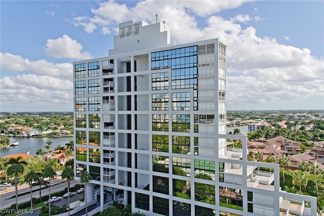 view of building exterior featuring a water view