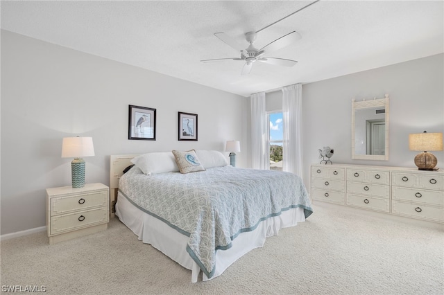 7000 Estero Blvd Unit 403, Fort Myers Beach, FL 33931 - bedroom with light carpet, ceiling fan, and baseboards