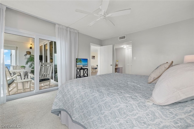 bedroom featuring light carpet, ceiling fan, and access to outside