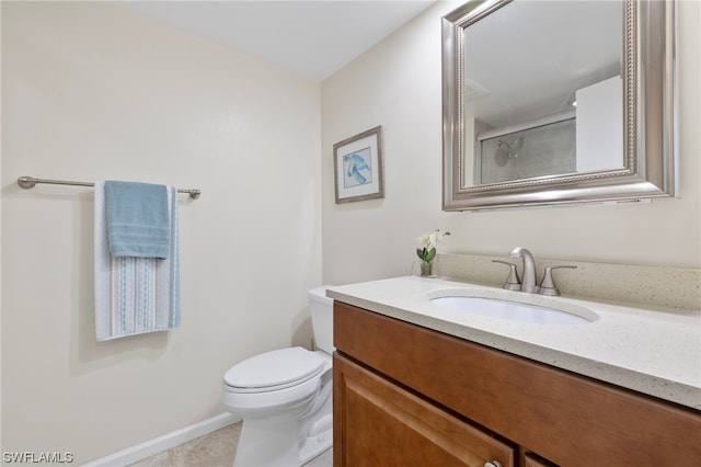 7000 Estero Blvd Unit 403, Fort Myers Beach, FL 33931 - bathroom with vanity, toilet, tile patterned floors, baseboards, and an enclosed shower