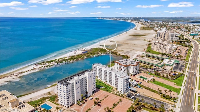 aerial view with a water view and a view of the beach