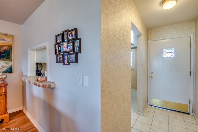 view of tiled entrance foyer