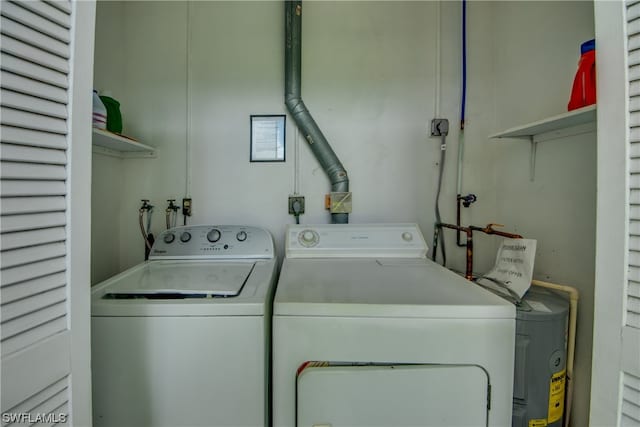 laundry area featuring electric dryer hookup, hookup for a washing machine, and independent washer and dryer