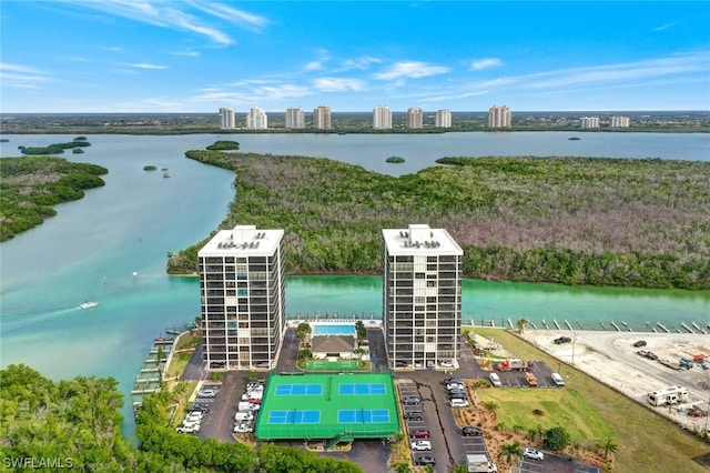 birds eye view of property featuring a water view