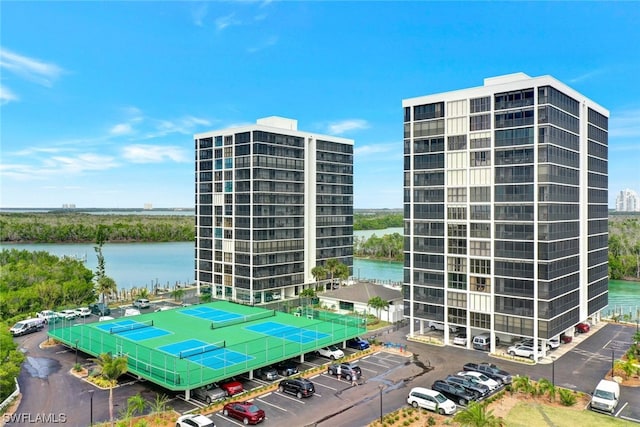 view of property with a water view