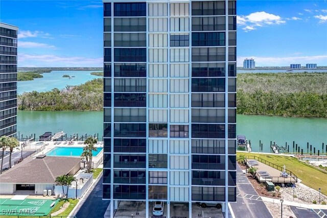 26235 Hickory Blvd Unit 4B, Bonita Springs, FL 34134 - view of apartment building / complex featuring a water view and a city view