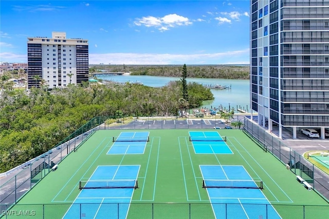 26235 Hickory Blvd Unit 4B, Bonita Springs, FL 34134 - view of tennis court with a water view, community basketball court, and fence