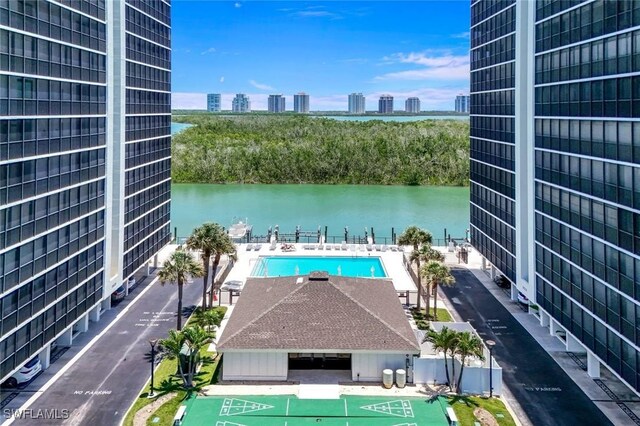 26235 Hickory Blvd Unit 4B, Bonita Springs, FL 34134 - view of pool featuring a water view and a view of city