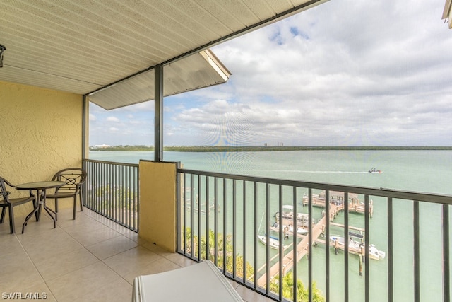 balcony featuring a water view