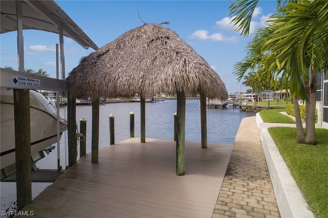 view of dock featuring a water view and boat lift