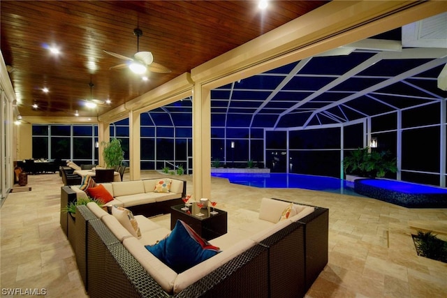 view of patio with an outdoor pool, a lanai, an outdoor living space, and a ceiling fan