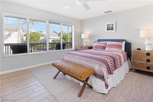 14865 Mango Ct, Captiva, FL 33924 - bedroom featuring ceiling fan, wood finished floors, visible vents, and baseboards