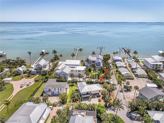 bird's eye view featuring a residential view and a water view