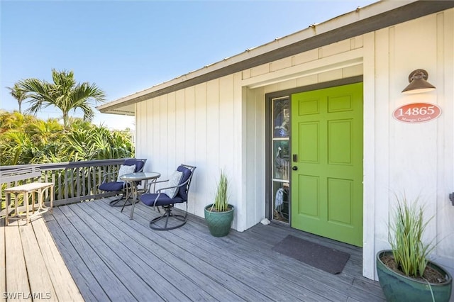 entrance to property featuring a deck