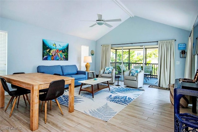 14865 Mango Ct, Captiva, FL 33924 - living room featuring beam ceiling, high vaulted ceiling, light wood-type flooring, and a ceiling fan