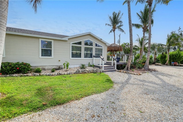 ranch-style house with a front yard