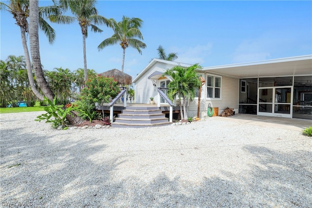 view of front of house featuring a carport