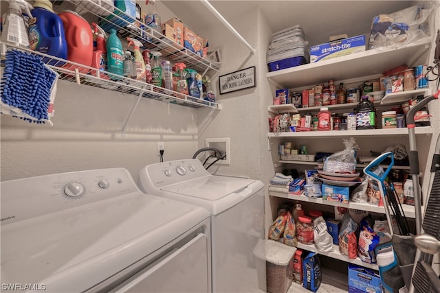 laundry room featuring washing machine and dryer