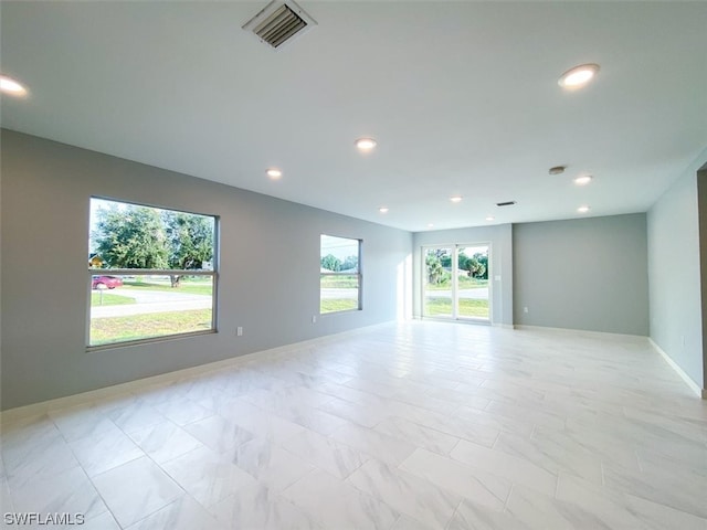 empty room with light tile flooring