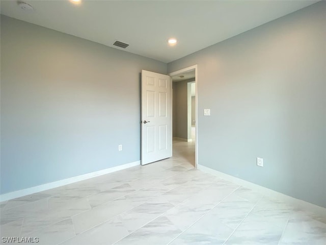 view of tiled empty room