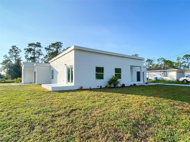 exterior space with a patio area and a front yard