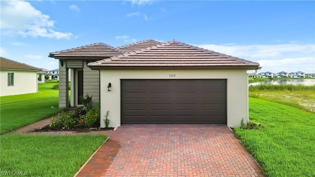 garage with a yard