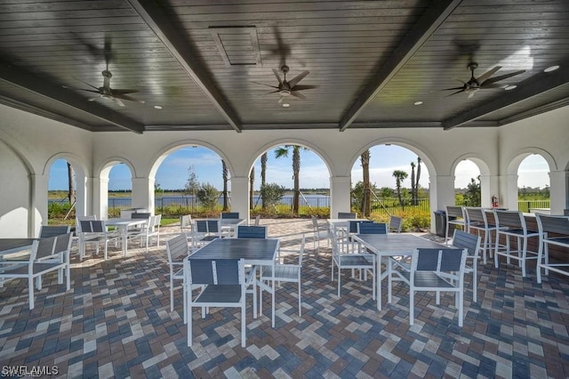 view of patio featuring ceiling fan