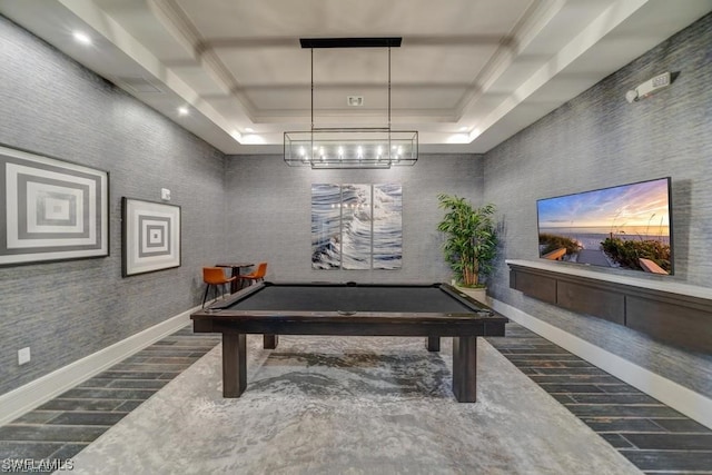 game room with a tray ceiling, dark tile floors, and pool table