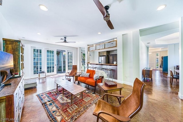 living room featuring ceiling fan