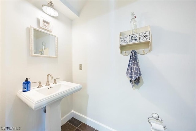 bathroom featuring sink and tile patterned flooring