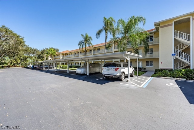 view of parking with a carport