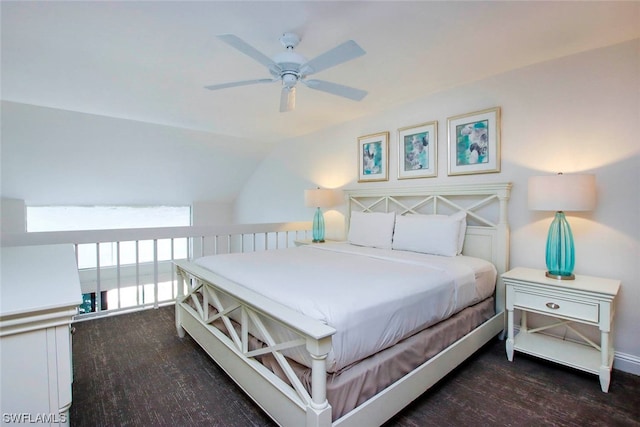 bedroom with lofted ceiling, ceiling fan, and dark hardwood / wood-style flooring