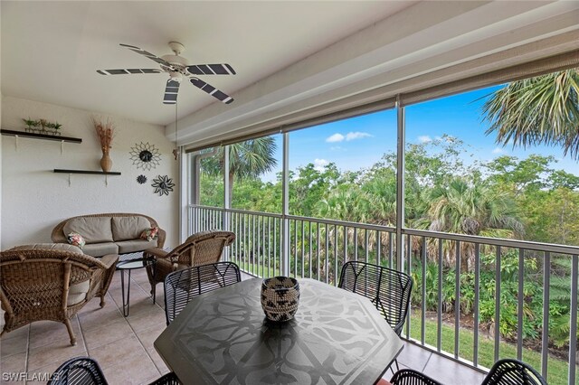 sunroom / solarium with ceiling fan