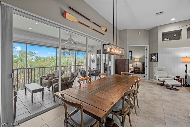 dining room featuring light tile patterned floors and ceiling fan