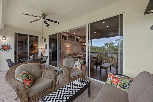 exterior space featuring ceiling fan