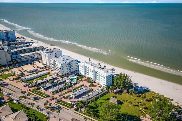 bird's eye view with a city view, a beach view, and a water view