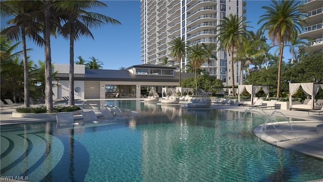 view of swimming pool with a patio