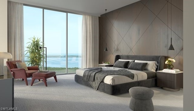 bedroom featuring light carpet, a wall of windows, access to exterior, and a water view