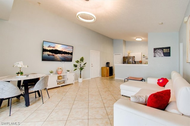 living room featuring light tile floors