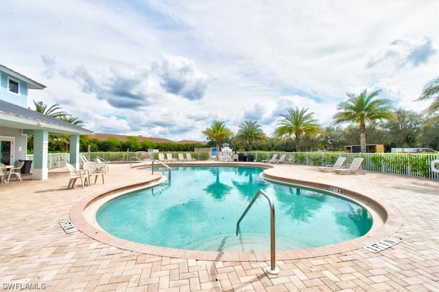 view of pool featuring a patio