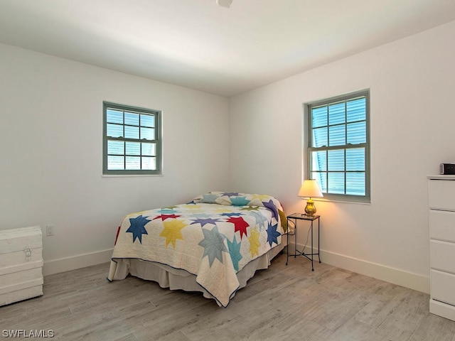 bedroom featuring light hardwood / wood-style floors