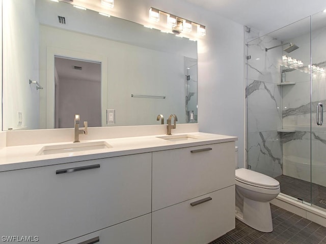 bathroom with walk in shower, vanity, toilet, and tile patterned flooring