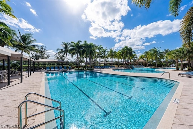 view of swimming pool featuring a patio area