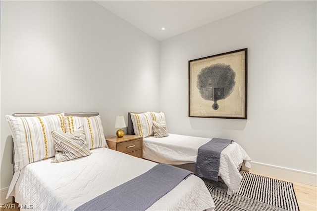 bedroom with light hardwood / wood-style flooring