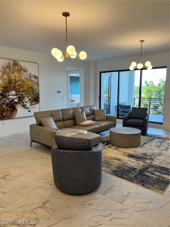 tiled living room featuring an inviting chandelier