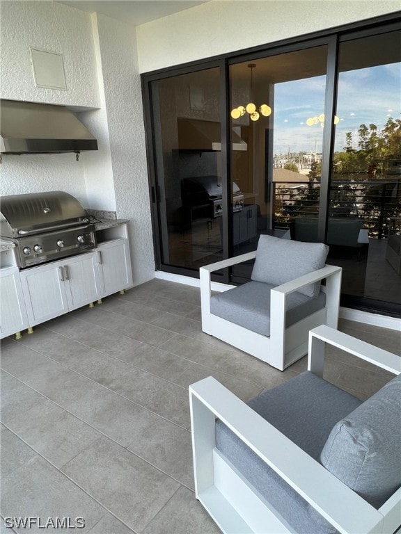 interior space featuring a grill and an outdoor living space