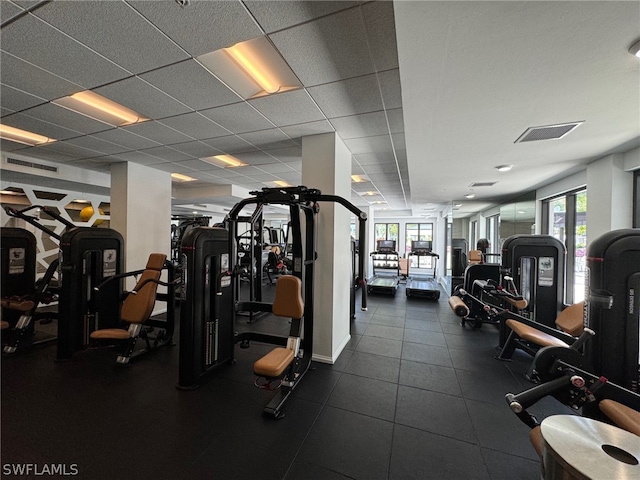 gym with a drop ceiling